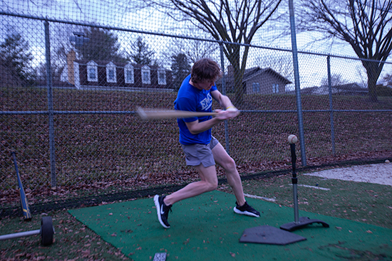 baseball player swinging